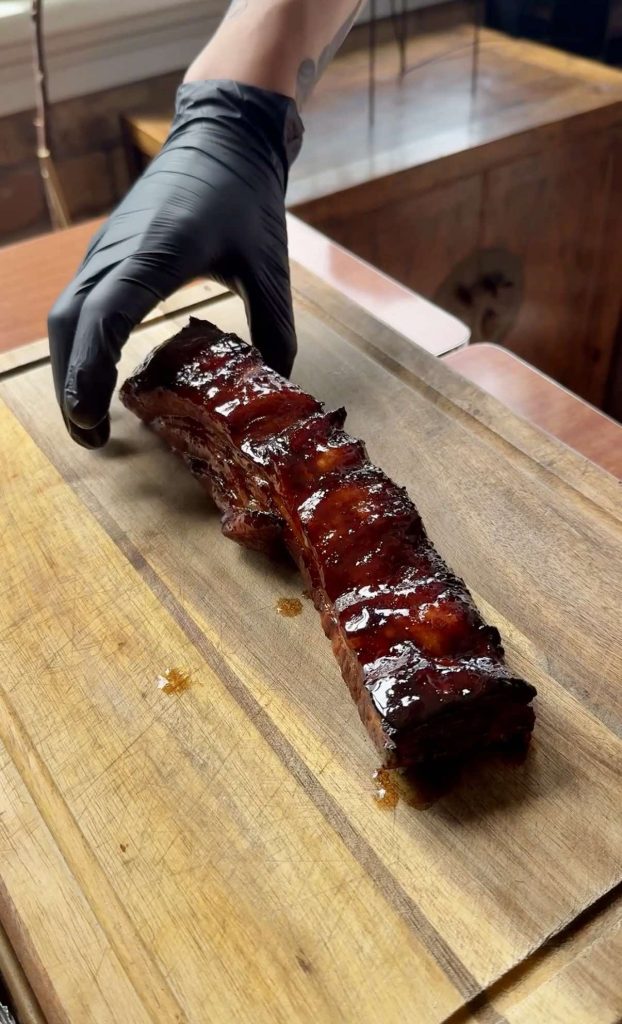 about to carve pork for The Best Char Siu Pork (Red BBQ Pork) recipe by Sam Low