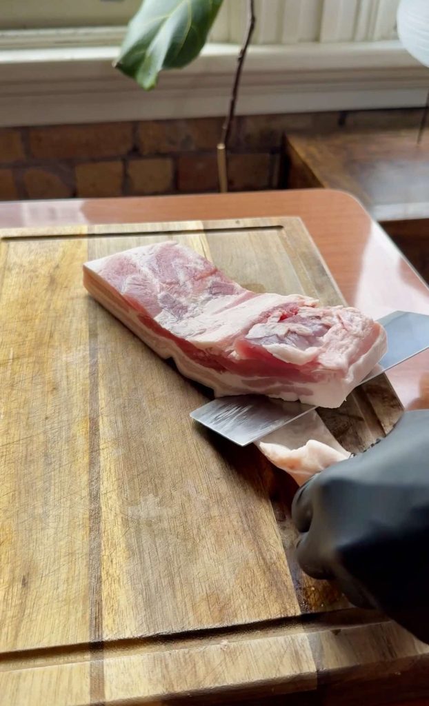 removing skin from pork belly for The Best Char Siu Pork (Red BBQ Pork) recipe by Sam Low